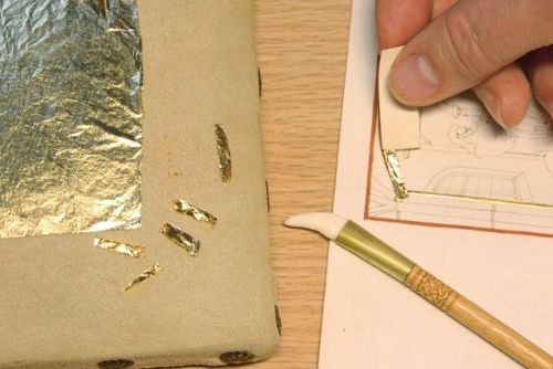 Gilding a 15th c. style illuminated manuscript book